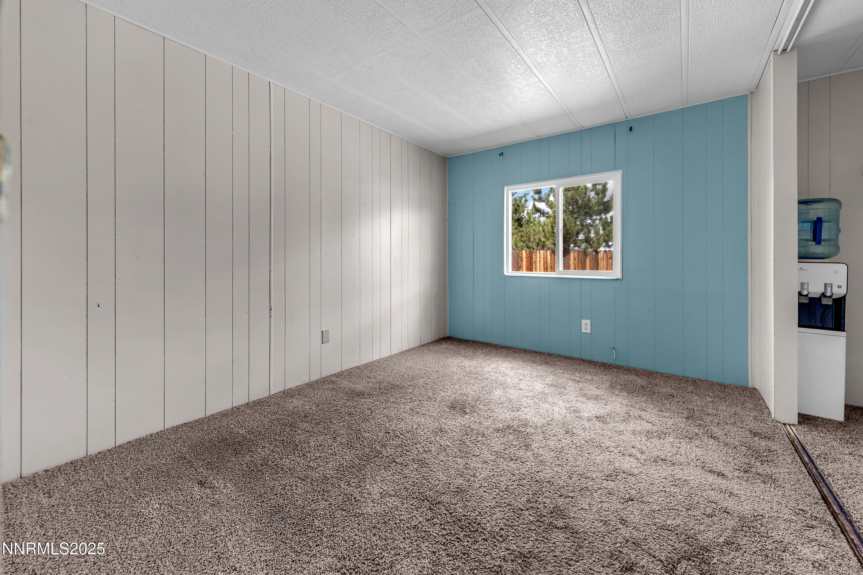 5760 Leon Drive Sun Valley, NV 89433 - Photo 24 of 42 a view of an empty room with a window