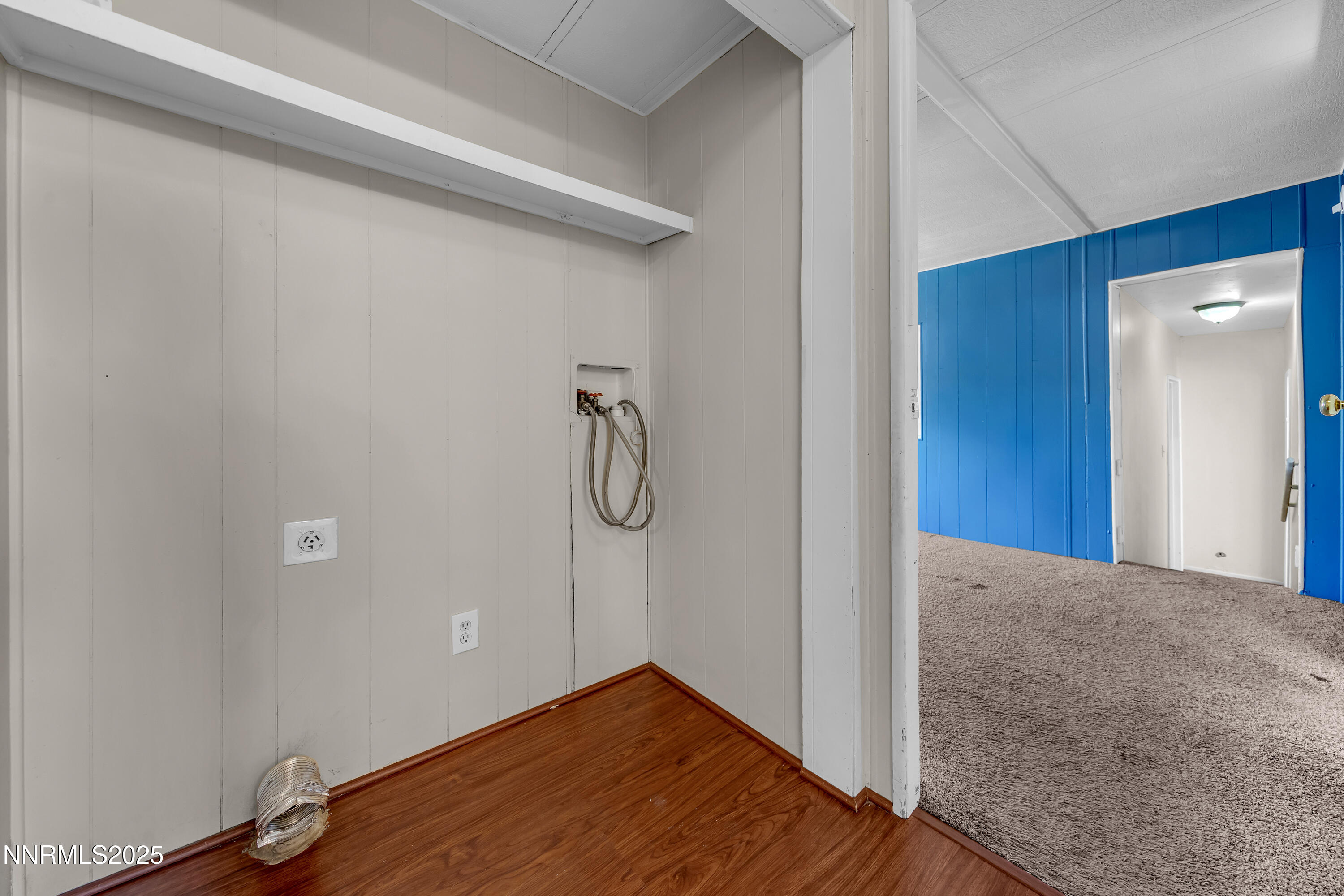 5760 Leon Drive Sun Valley, NV 89433 - Photo 26 of 42 a view of a room with wooden floor