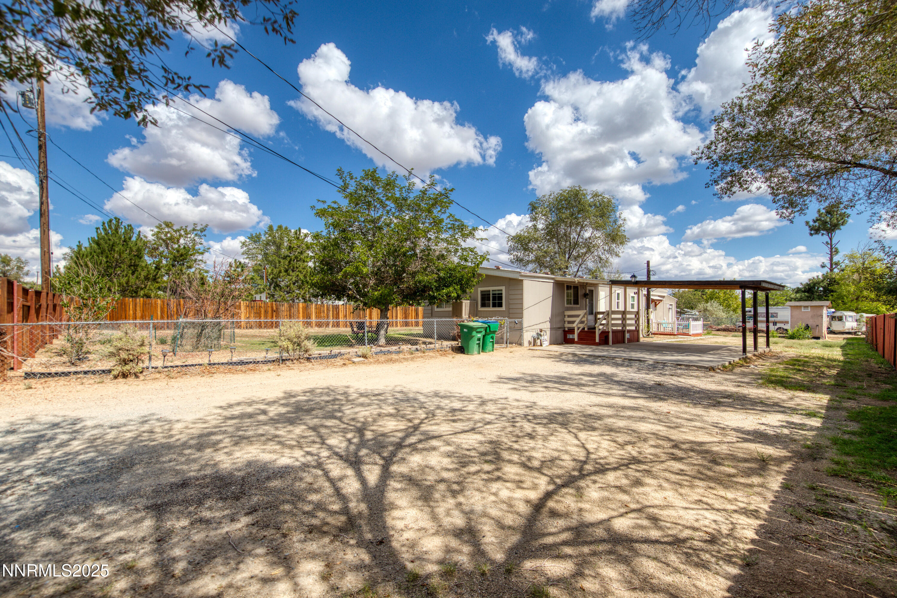 5760 Leon Drive Sun Valley, NV 89433 - Photo 28 of 42 a view of a house with a yard