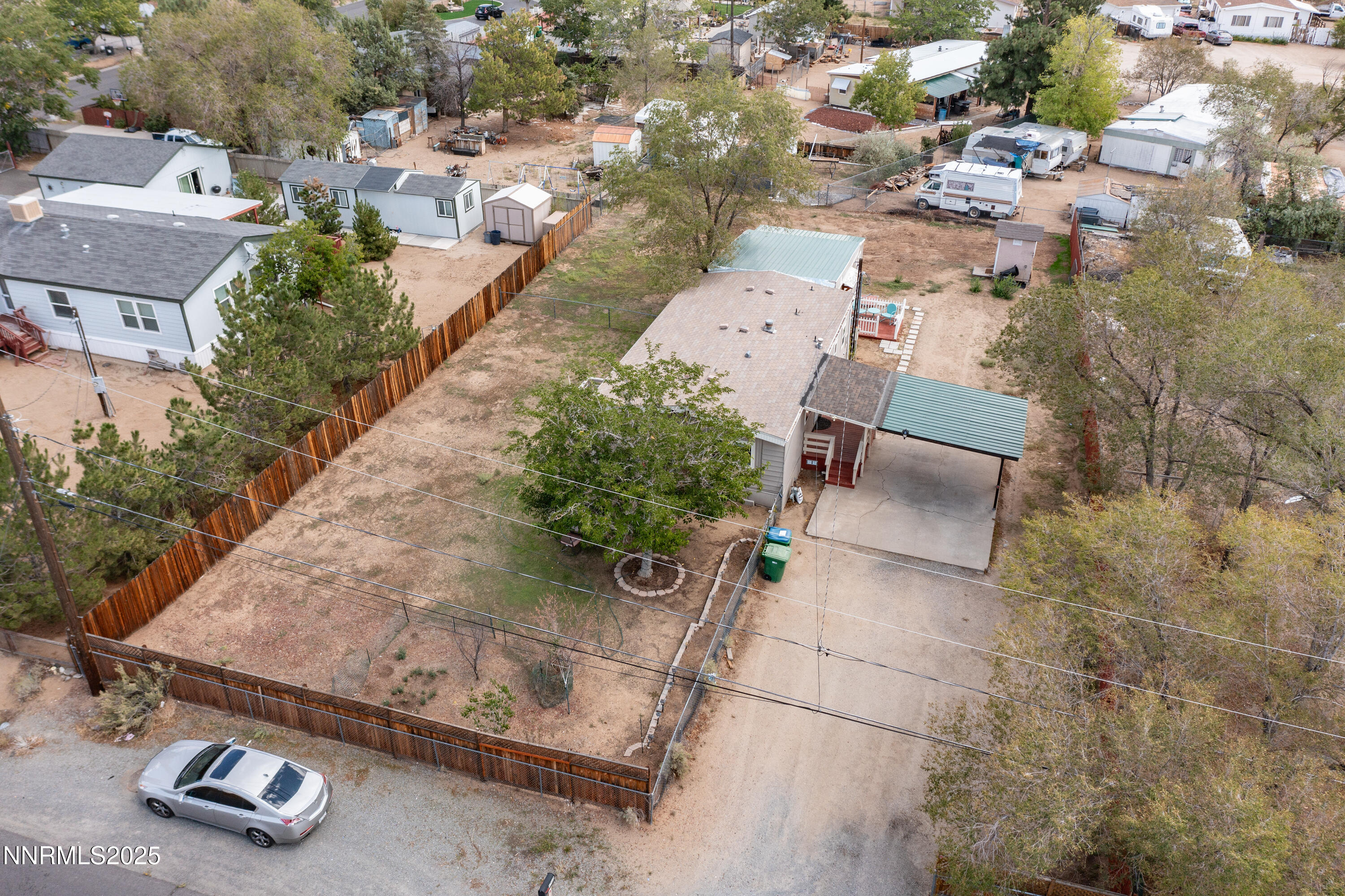 5760 Leon Drive Sun Valley, NV 89433 - Photo 3 of 42 an aerial view of a house with a yard