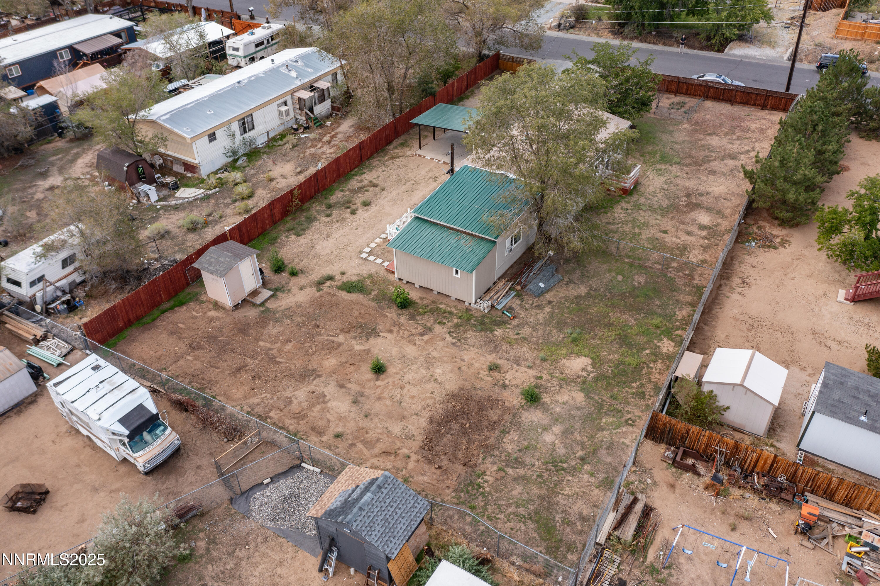 5760 Leon Drive Sun Valley, NV 89433 - Photo 40 of 42 an aerial view of a house with a yard