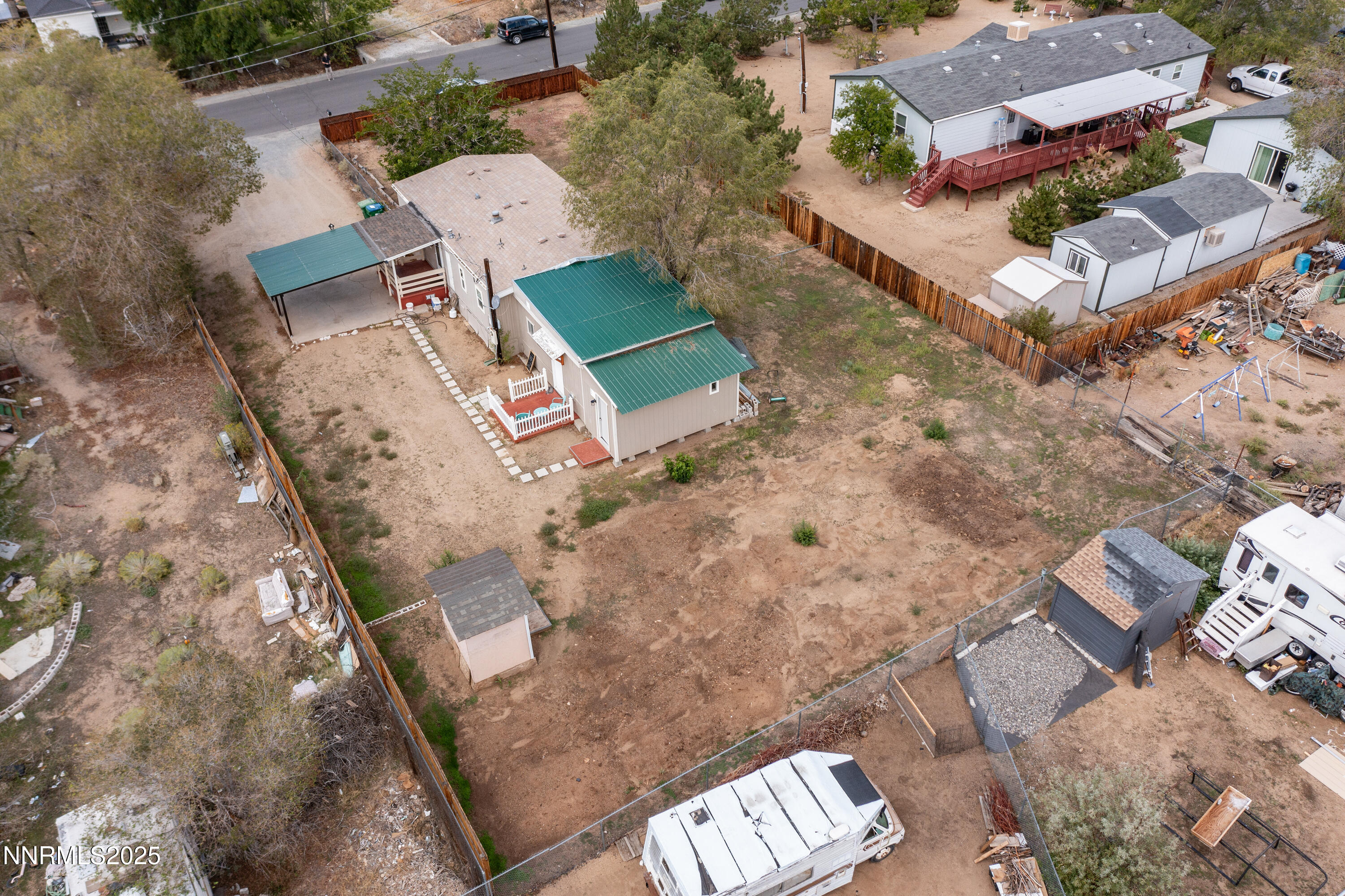 5760 Leon Drive Sun Valley, NV 89433 - Photo 42 of 42 an aerial view of a house with a yard
