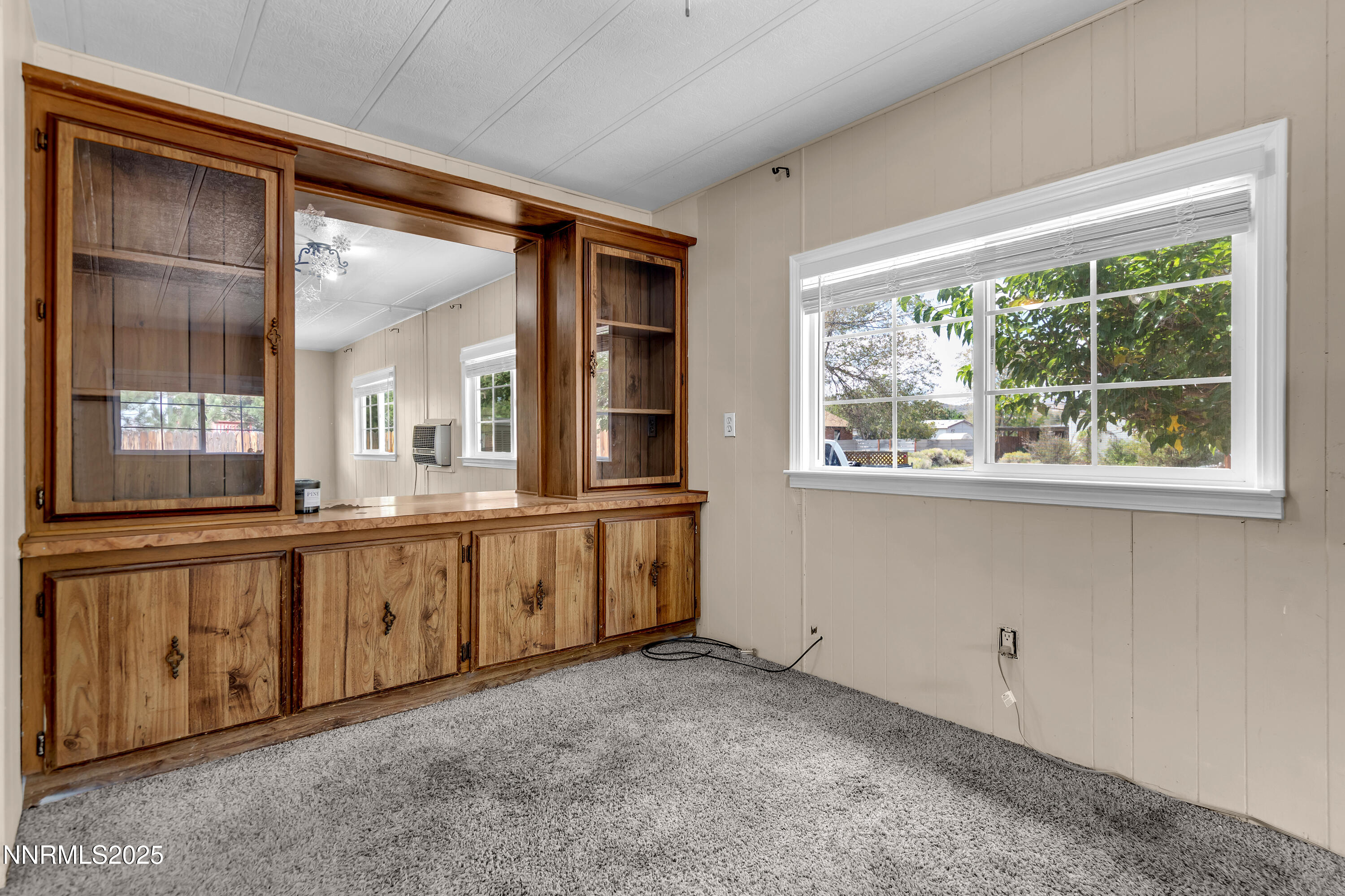 5760 Leon Drive Sun Valley, NV 89433 - Photo 9 of 42 a view of an empty room with a window