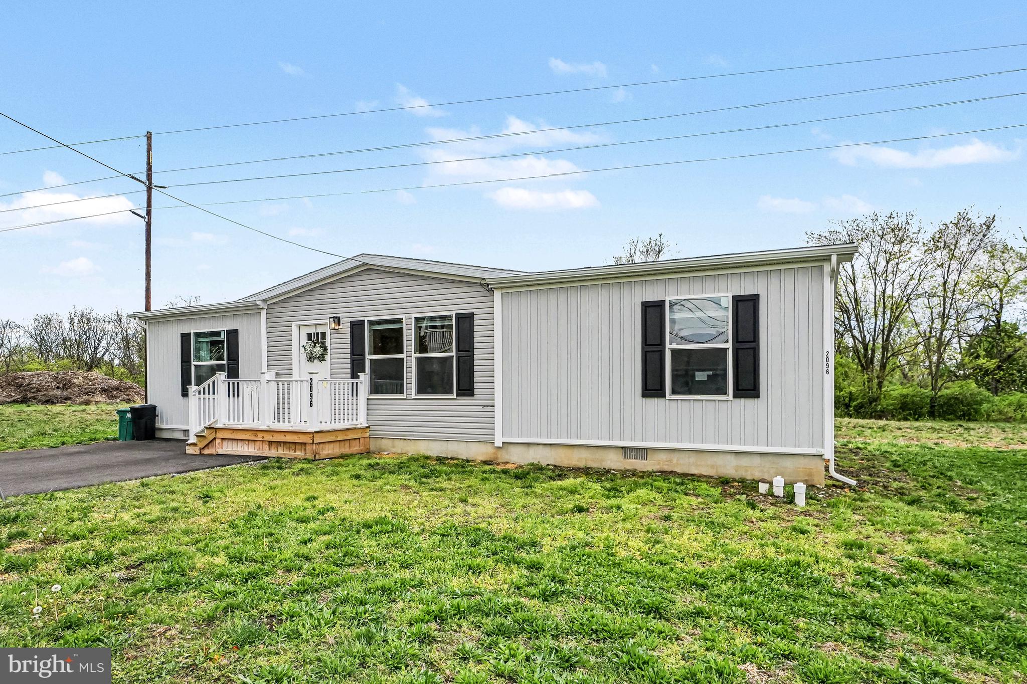 2096 Scull Street Lebanon, PA 17046 - Photo 2 of 28 a front view of house with yard and green space