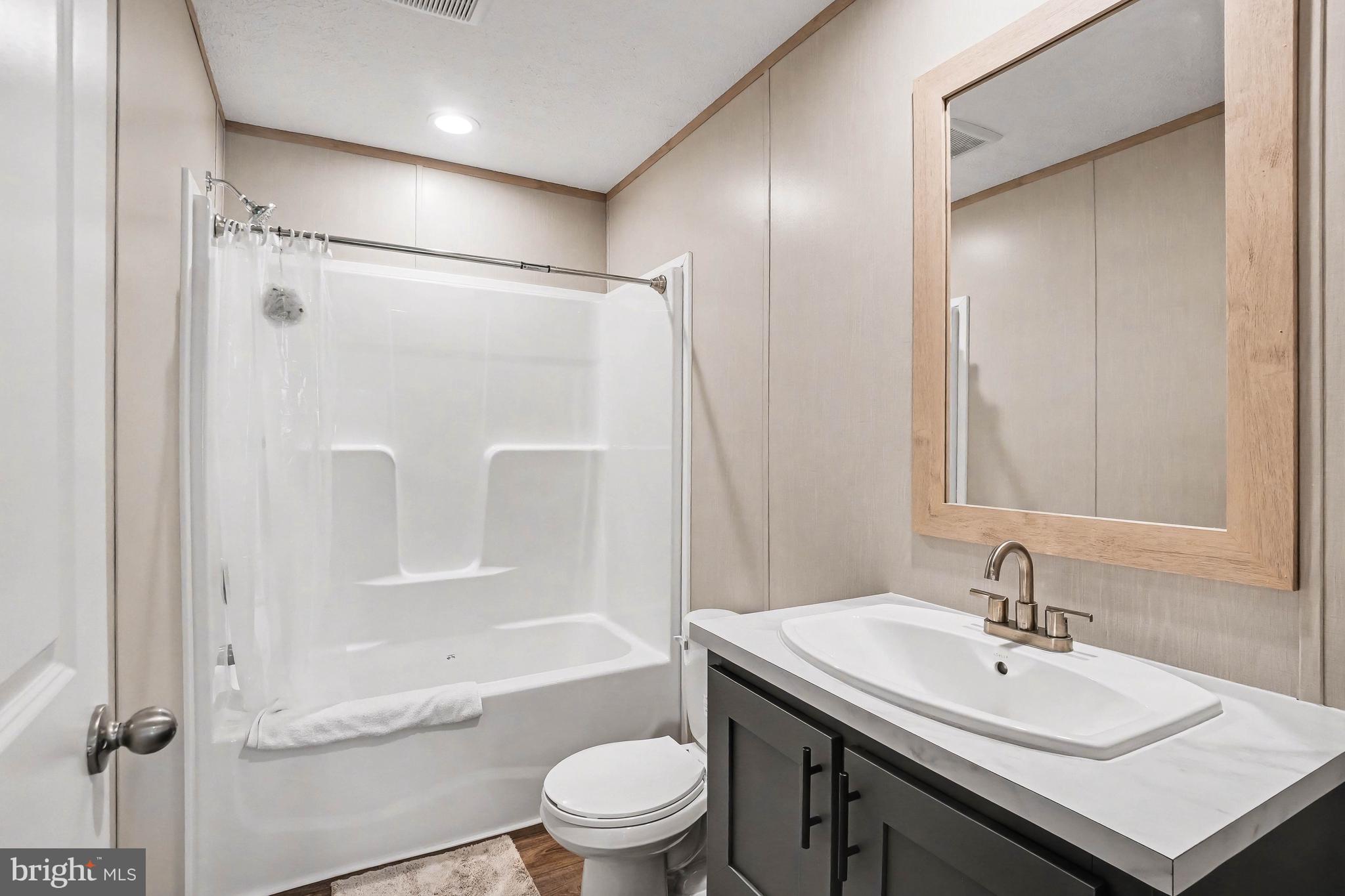 2096 Scull Street Lebanon, PA 17046 - Photo 21 of 28 a bathroom with a sink toilet and shower