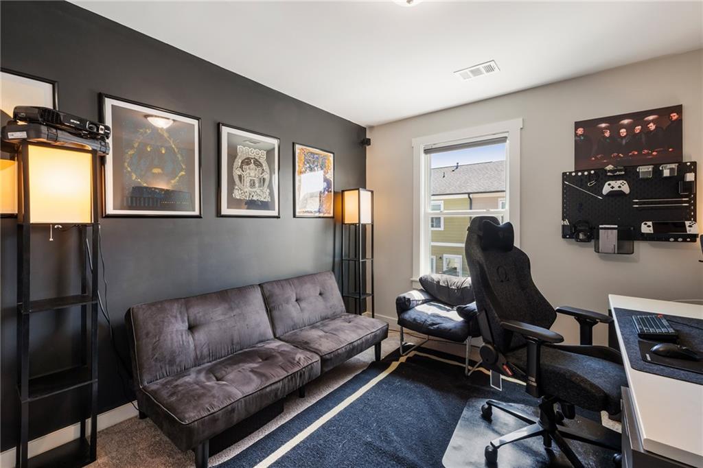 278 Perry Point Run, Unit 56 Lawrenceville, GA 30046 - Photo 22 of 36 a living room with furniture