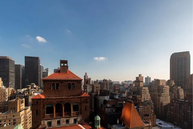 a bathroom with a sink a toilet and bathtub