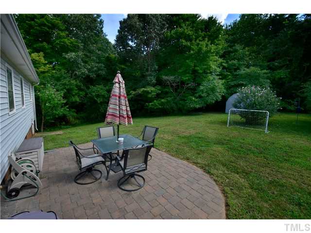 7309 Mine Valley Road Raleigh, NC 27615 - Photo 14 of 15 a view of a backyard with furniture