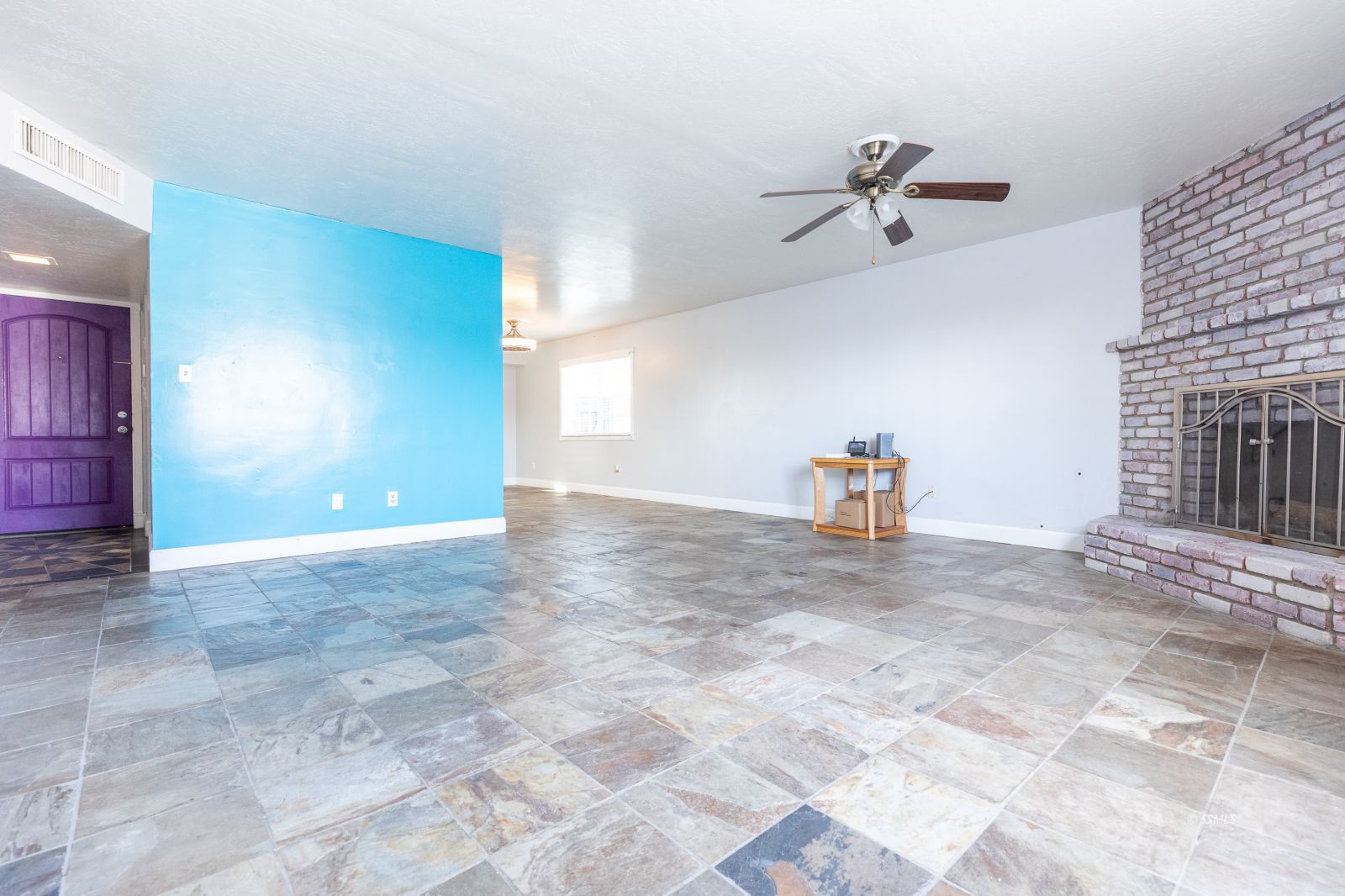 333 West Perdew Avenue Ridgecrest, CA 93555 - Photo 8 of 29 a view of empty room with a fireplace