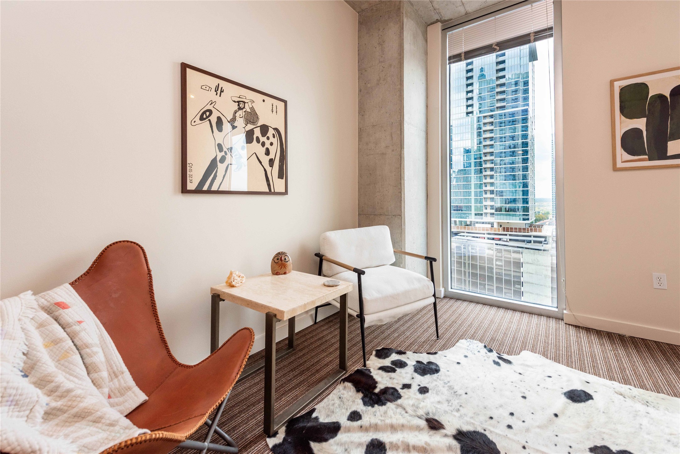 360 Nueces Street, Unit 1214 Austin, TX 78701 - Photo 4 of 38 Living area featuring floor to ceiling windows and carpet flooring