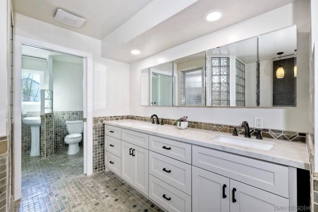 a room with a bed and a chair