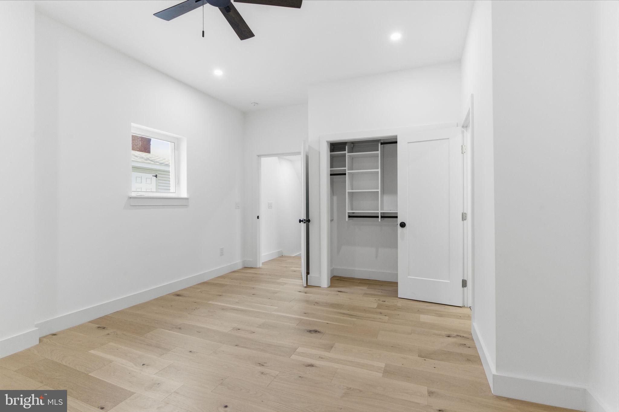 2724-26 East Somerset Street, Unit 1 Philadelphia, PA 19134 - Photo 15 of 21 an empty room with closet and windows
