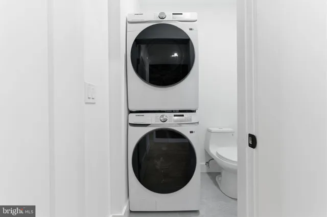 a bathroom with a toilet and a sink