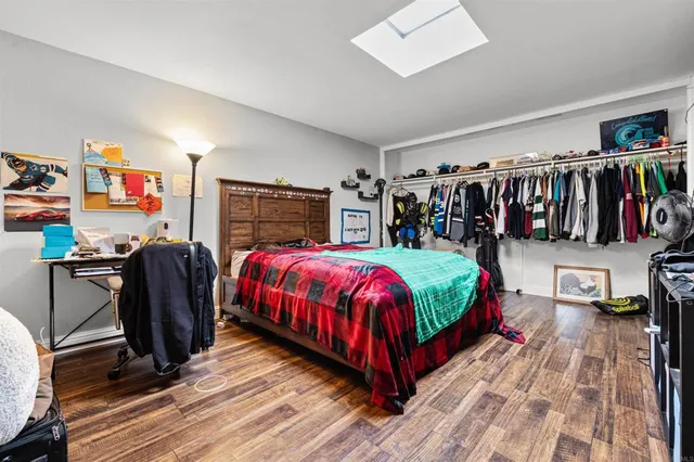 a view of a house with pool and trees