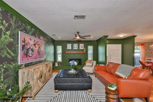 a outdoor living space with furniture and a potted plant