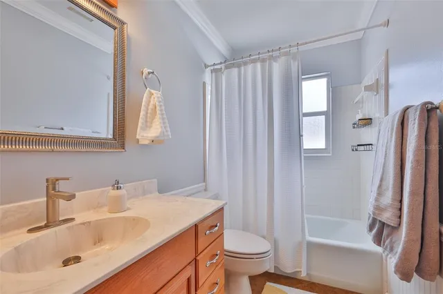 a bathroom with a sink a mirror and a shower