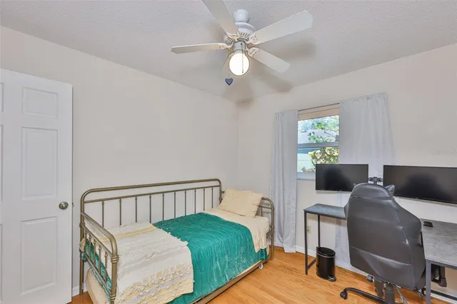 a view of a swimming pool with a yard