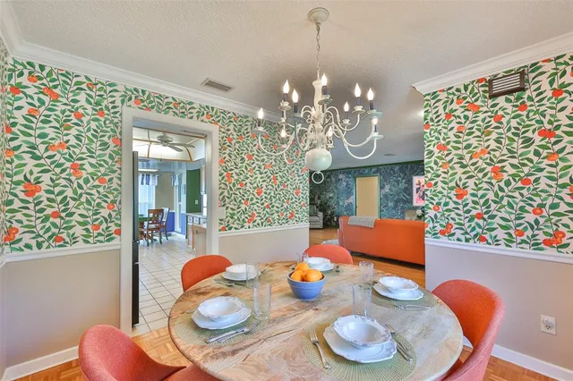 a kitchen with stainless steel appliances a sink stove and cabinets