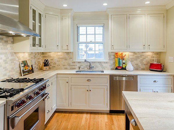 35 Bothfeld Road Newton, MA 02459 - Photo 7 of 25 a kitchen with a stove a sink and a window
