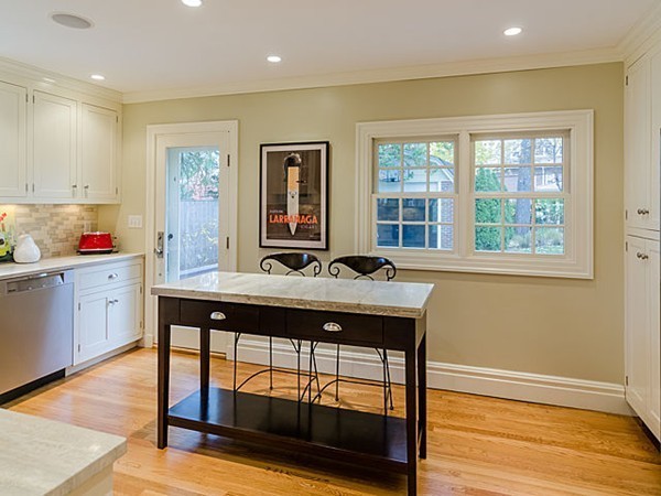 35 Bothfeld Road Newton, MA 02459 - Photo 9 of 25 a kitchen with a sink cabinets and wooden floor