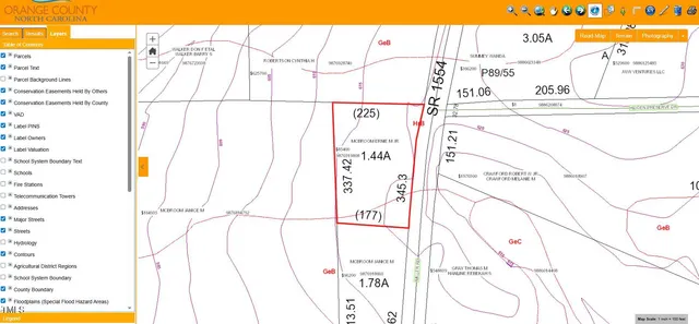 close up of white appliances with wooden floor