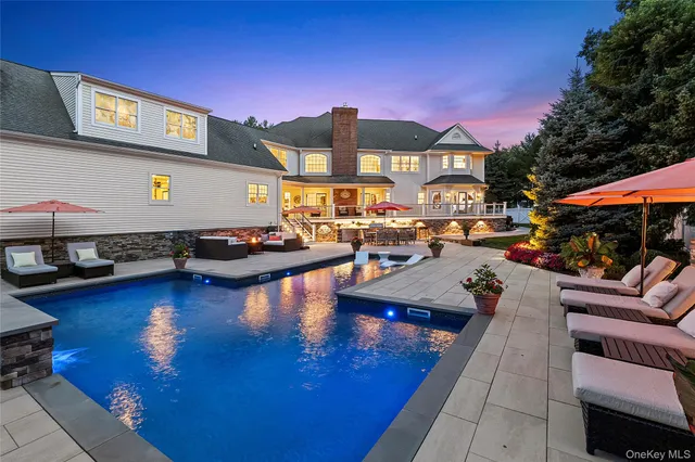 a view of a swimming pool with a patio