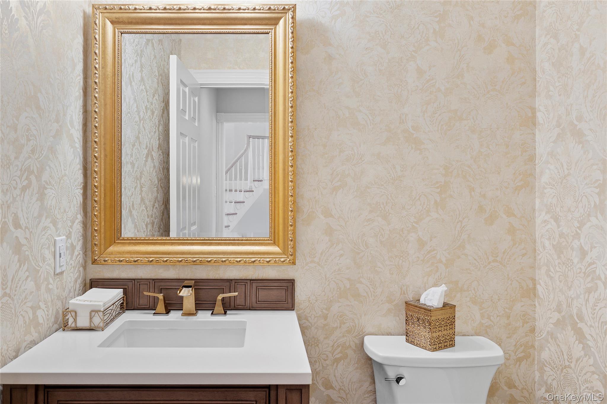 2 North Harbor Down Miller Place, NY 11764 - Photo 18 of 49 a bathroom with a sink and a mirror