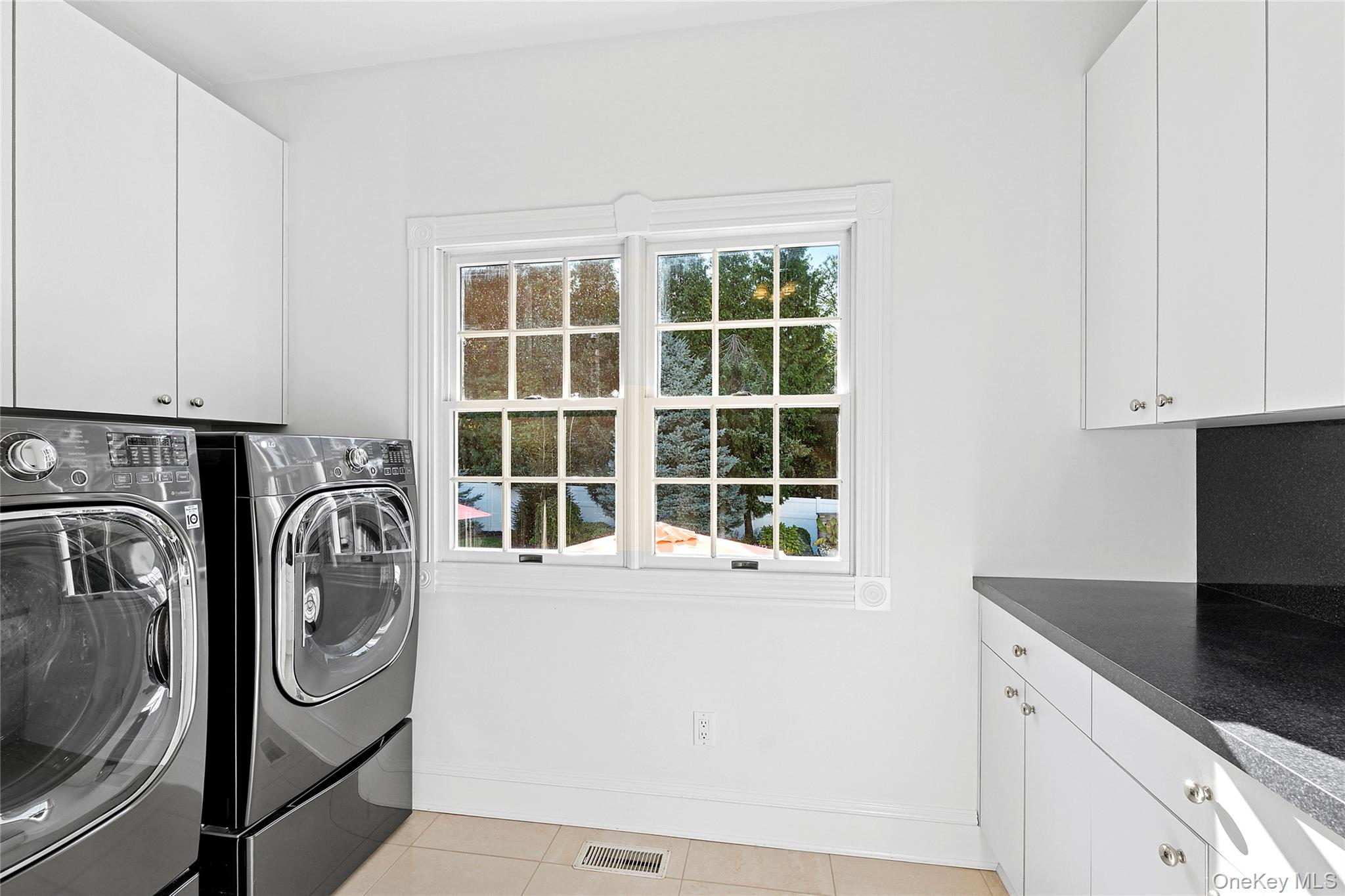 2 North Harbor Down Miller Place, NY 11764 - Photo 19 of 49 a utility room with dryer and washer