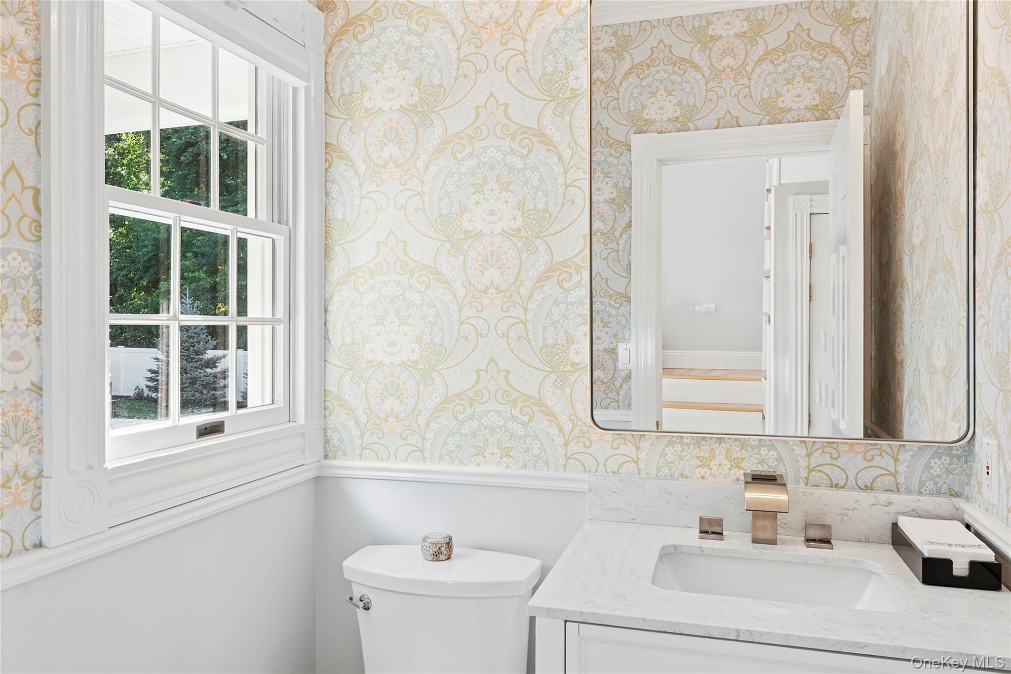 2 North Harbor Down Miller Place, NY 11764 - Photo 20 of 49 a bathroom with a sink and a toilet