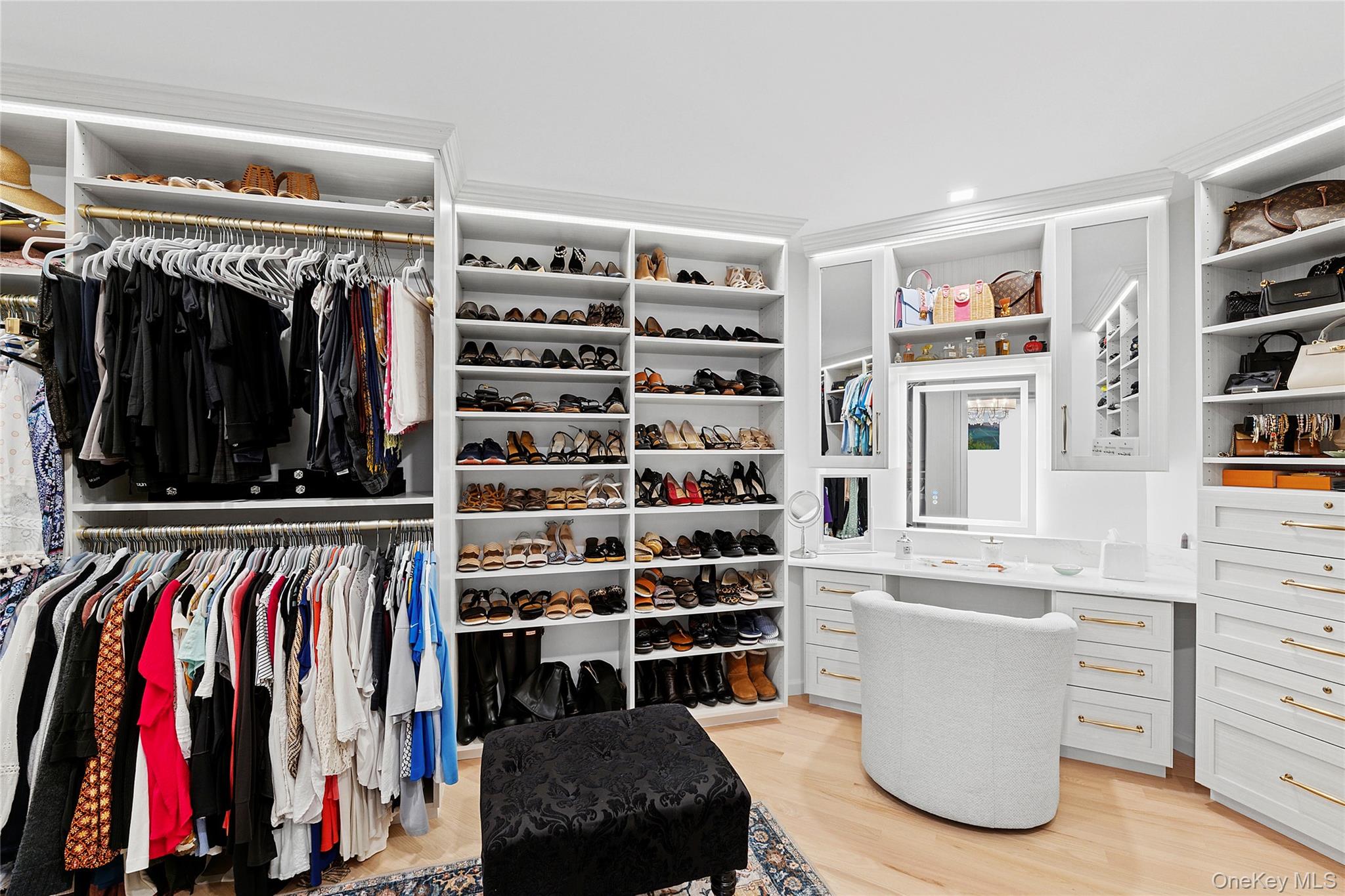 2 North Harbor Down Miller Place, NY 11764 - Photo 30 of 49 a view of walk in closet with clothes and shoes