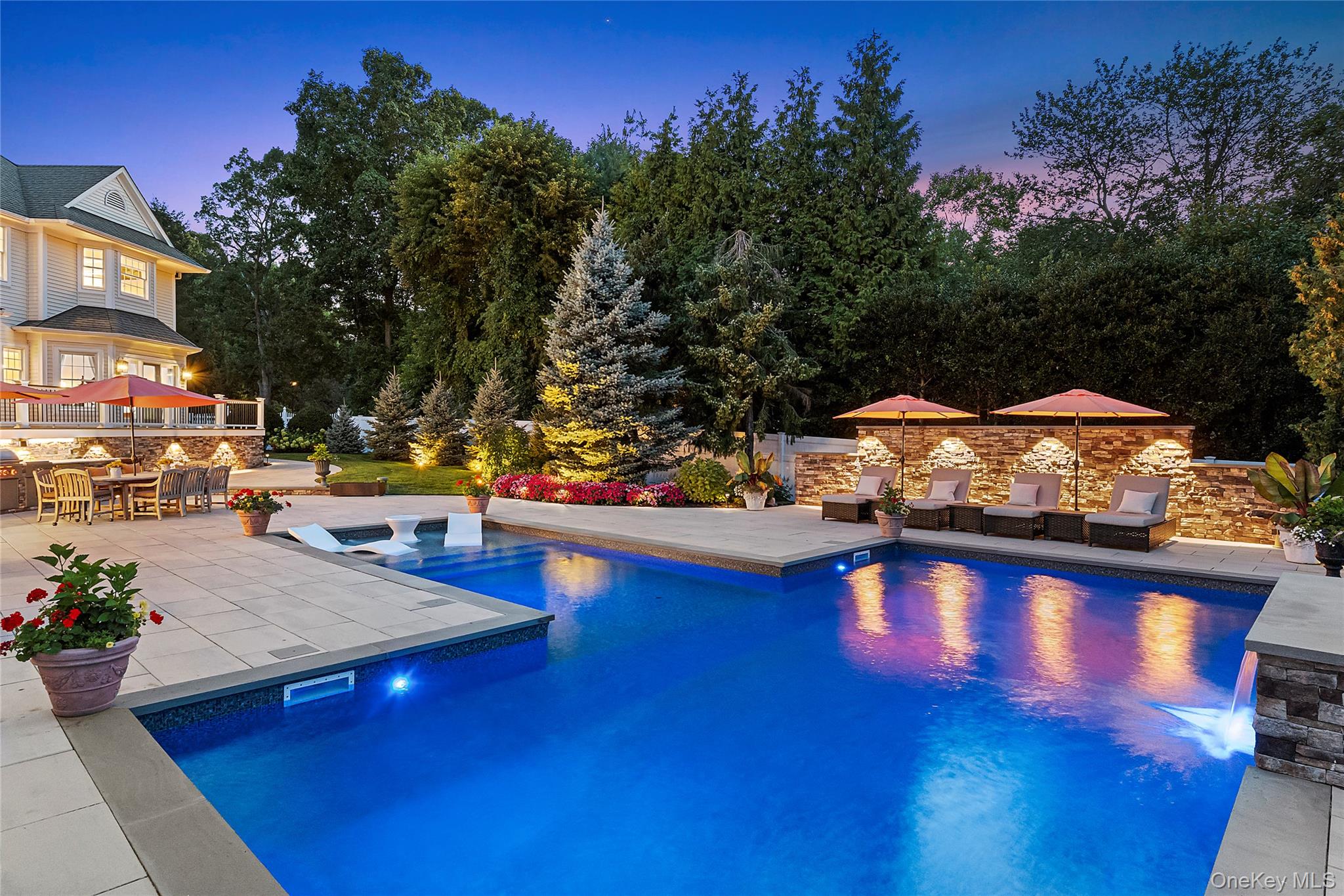 2 North Harbor Down Miller Place, NY 11764 - Photo 43 of 49 a view of swimming pool with outdoor seating and trees in the background