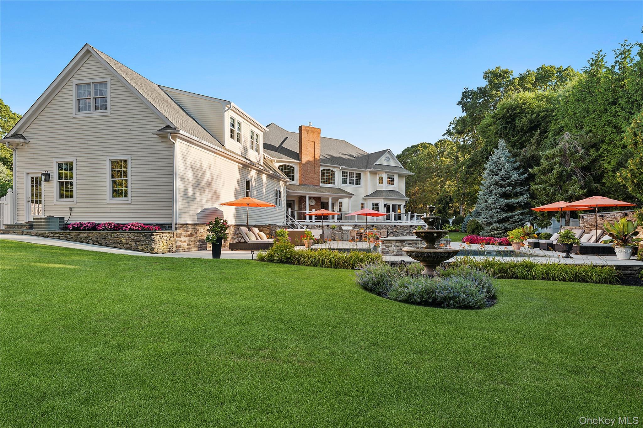 2 North Harbor Down Miller Place, NY 11764 - Photo 46 of 49 a front view of house with yard and outdoor seating