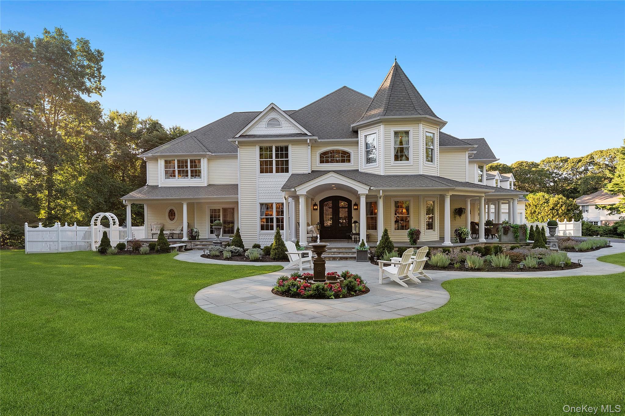 2 North Harbor Down Miller Place, NY 11764 - Photo 5 of 49 a front view of a house with garden and trees