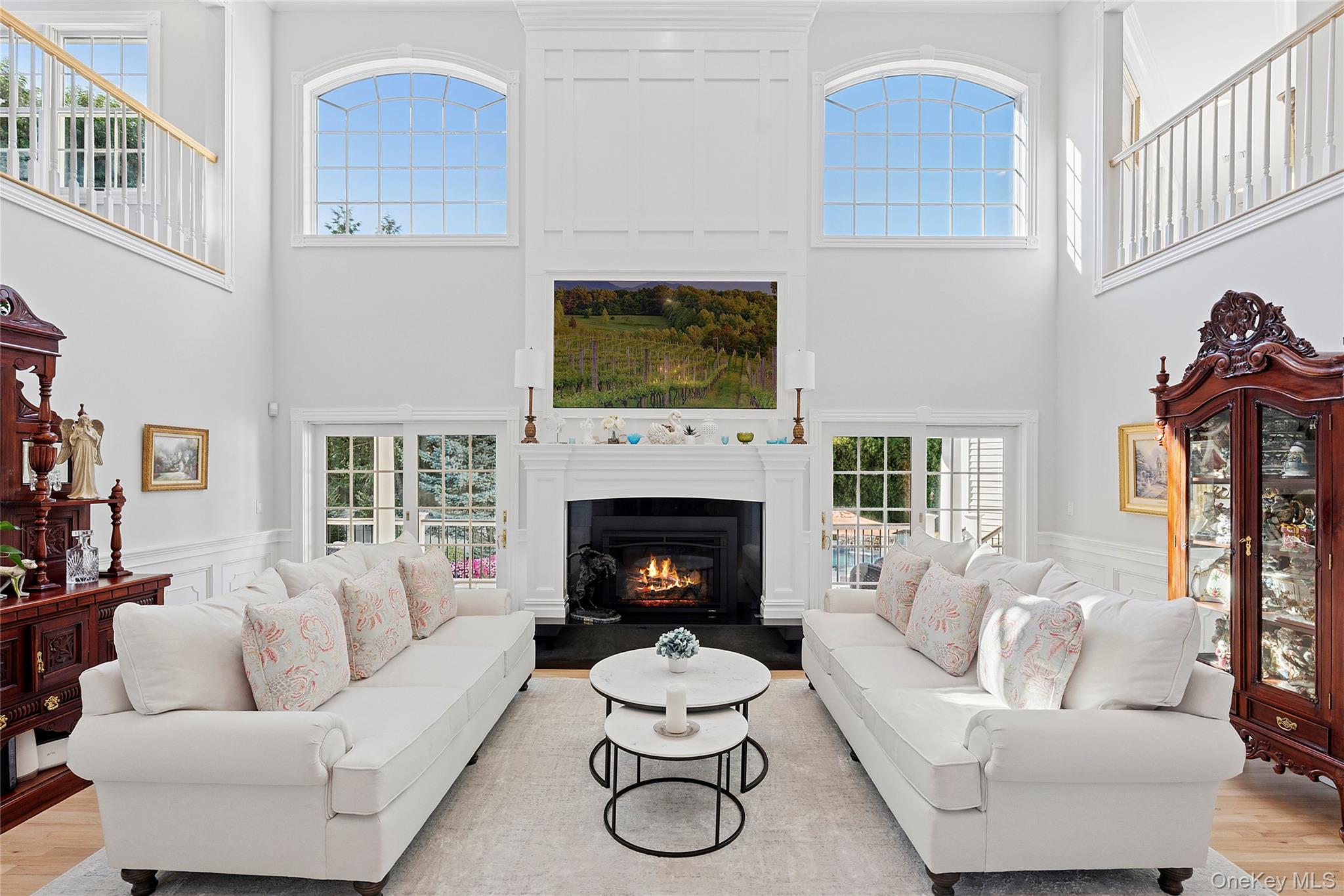 2 North Harbor Down Miller Place, NY 11764 - Photo 9 of 49 a living room with furniture a fireplace and a flat screen tv