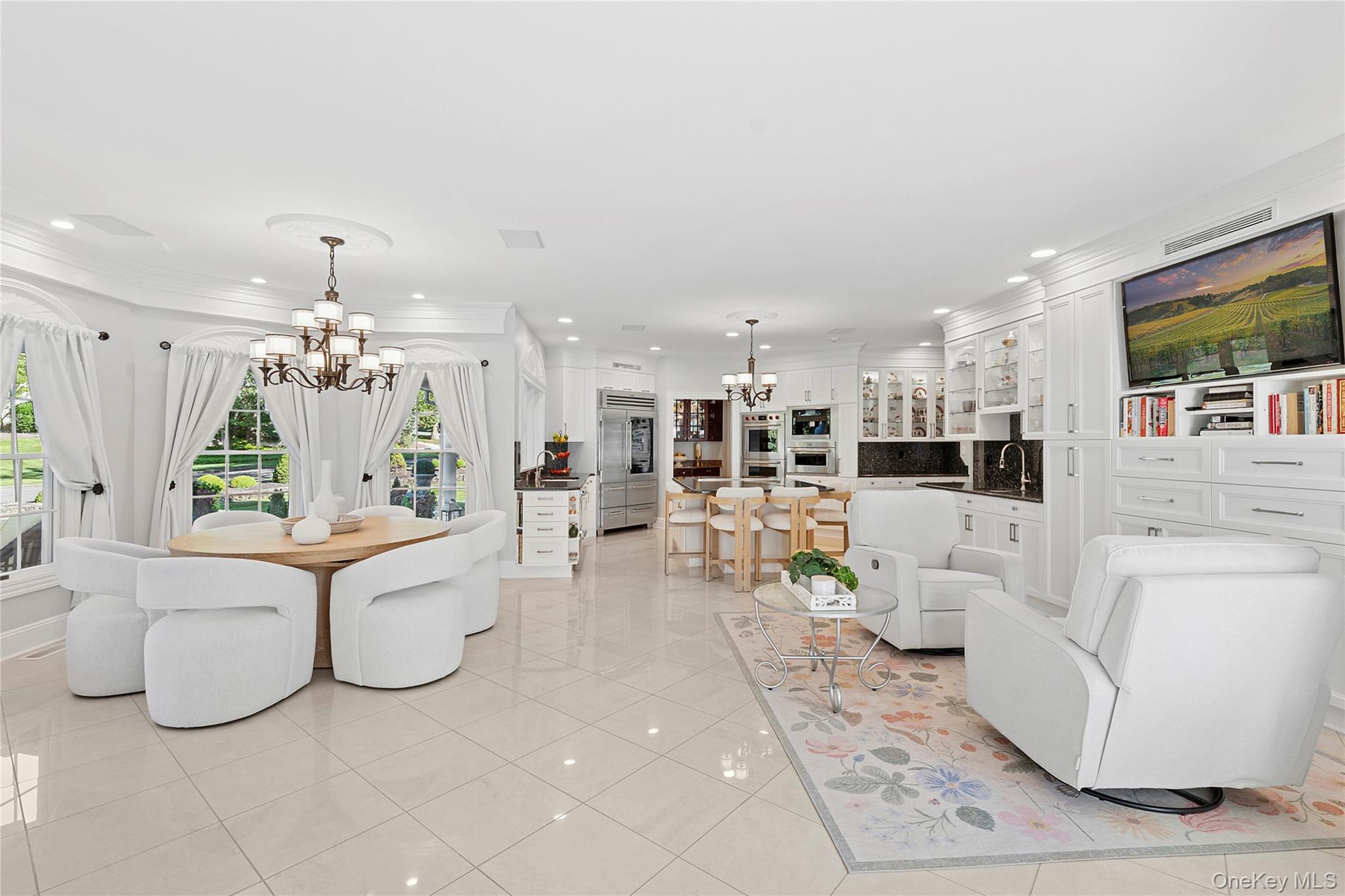 2 North Harbor Down Miller Place, NY 11764 - Photo 10 of 49 a living room with furniture and a chandelier