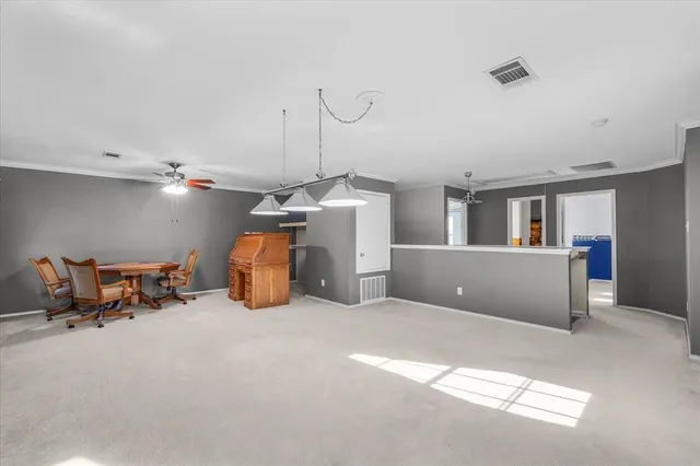 a room with furniture and a chandelier