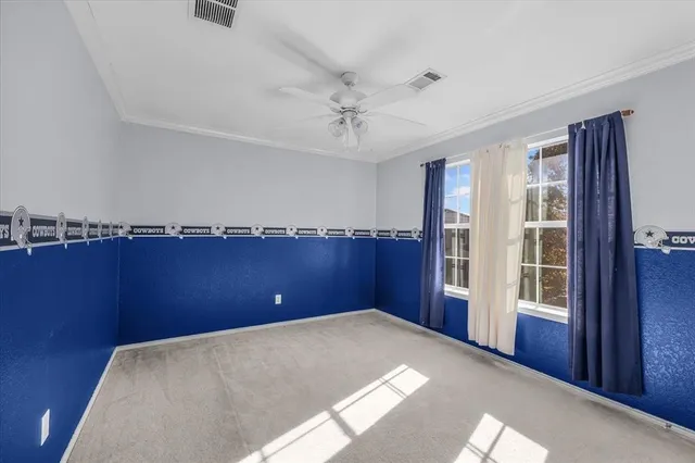 a view of a room with furniture and cabinet