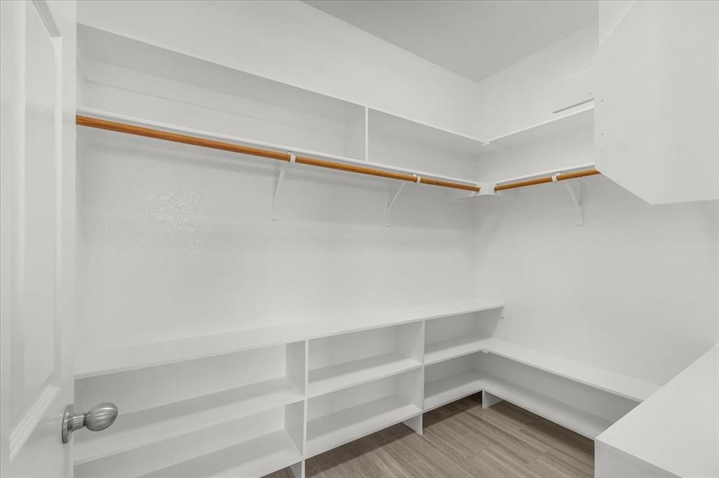 3625 Black Ranch Court Fort Worth, TX 76262 - Photo 21 of 30 a view of an empty walk in closet