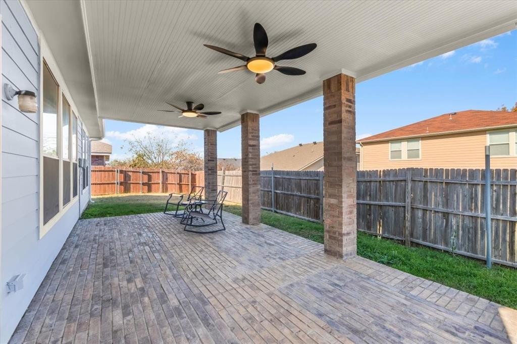 3625 Black Ranch Court Fort Worth, TX 76262 - Photo 28 of 30 a view of roof deck with wooden fence