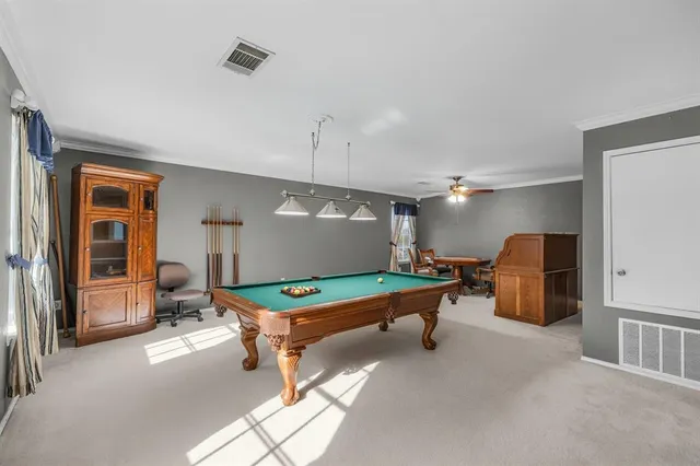 a room with furniture and gym equipment