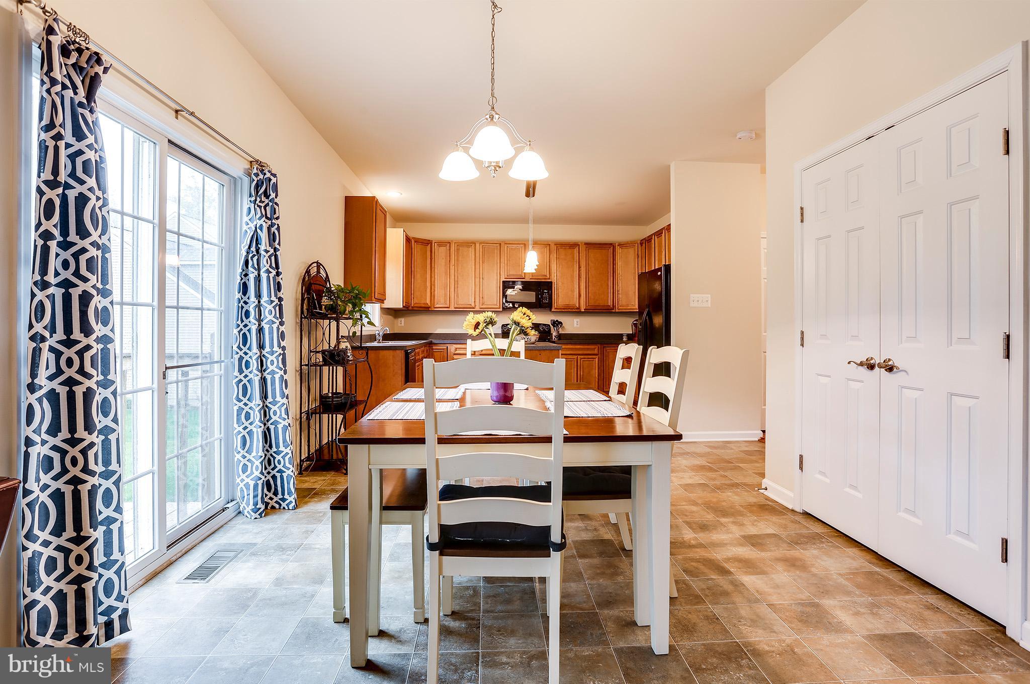 8445 High Ridge Road Ellicott City, MD 21043 - Photo 3 of 28 Kitchen w/slider to rear yard