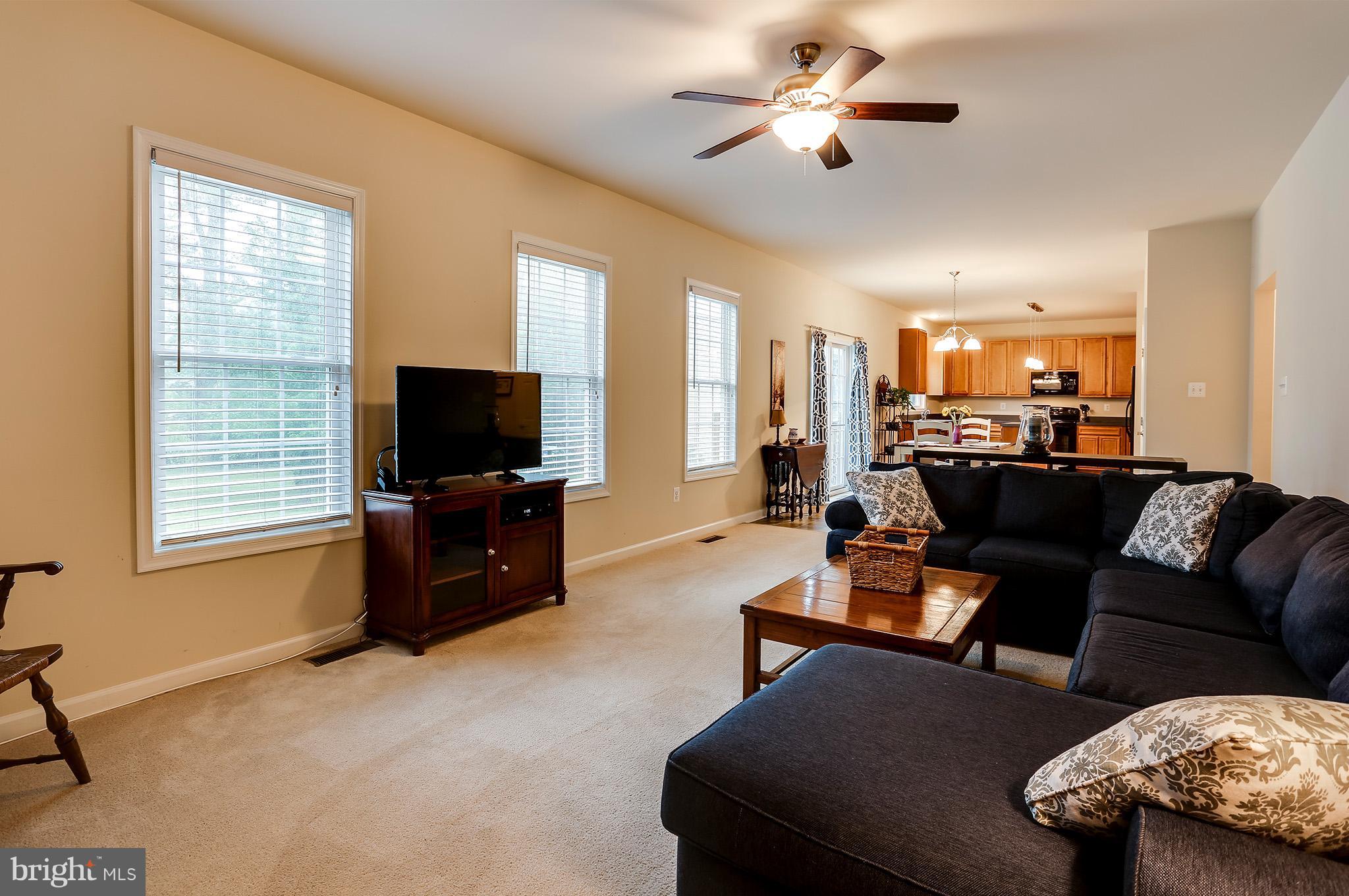 8445 High Ridge Road Ellicott City, MD 21043 - Photo 9 of 28 Family room opens to kitchen