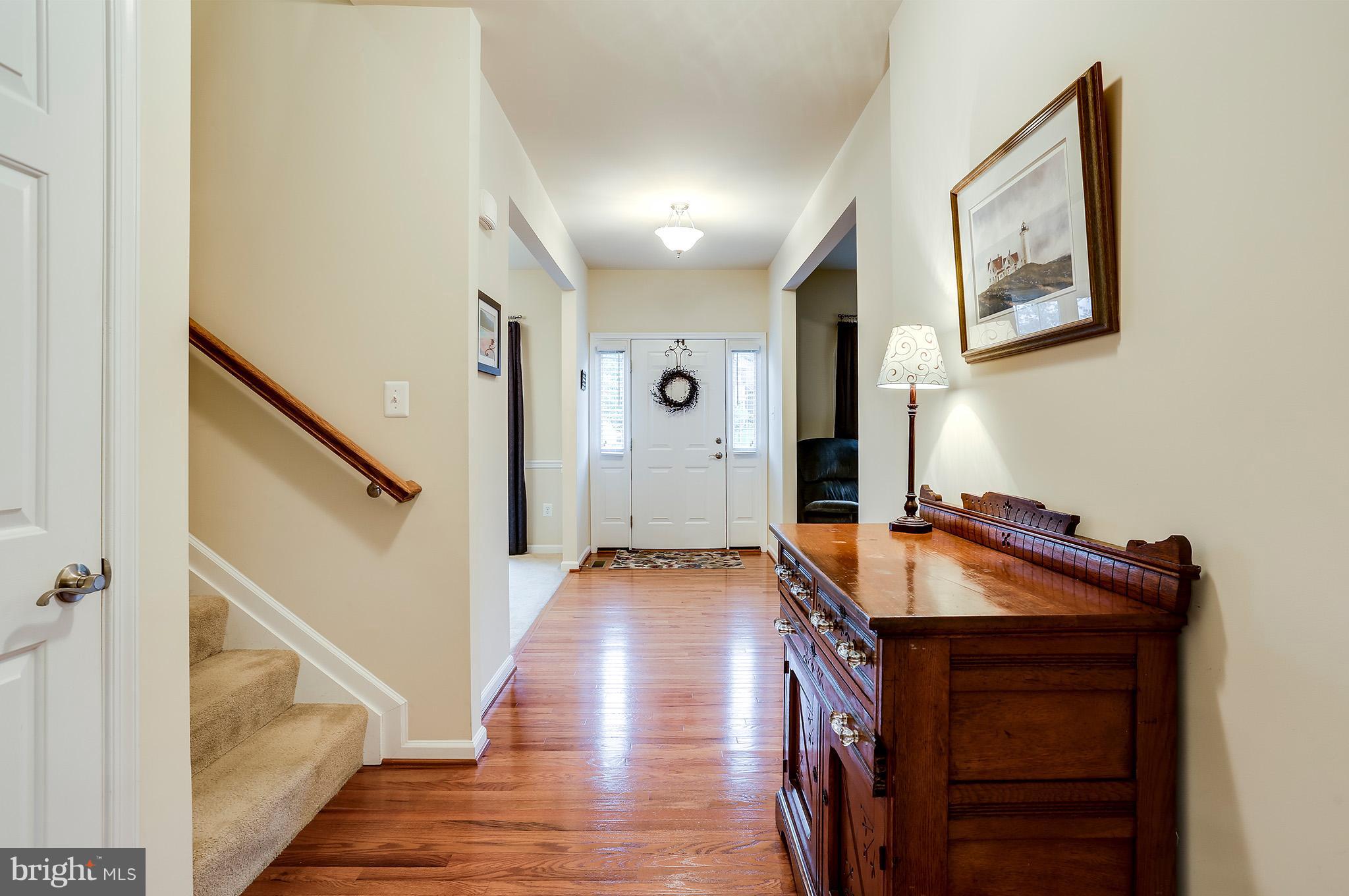 8445 High Ridge Road Ellicott City, MD 21043 - Photo 10 of 28 Welcoming foyer w/hardwood floors
