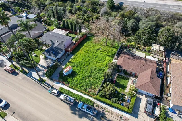an aerial view of a house with a garden