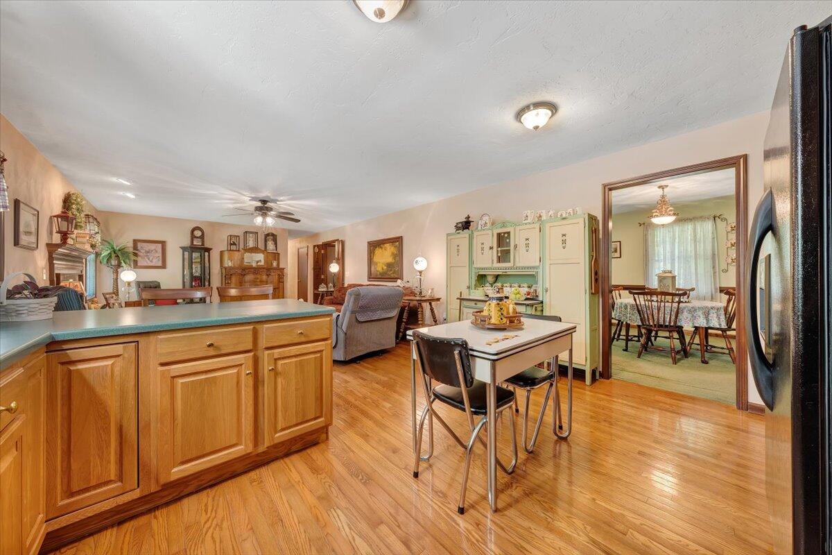 4081 Daugherty Road Salem, VA 24153 - Photo 15 of 34 a living room with furniture a wooden floor and next to a window