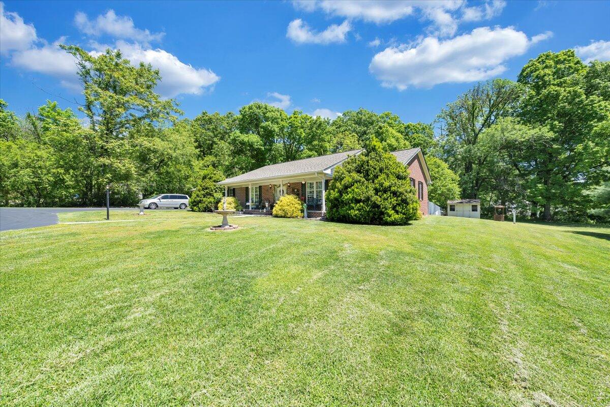 4081 Daugherty Road Salem, VA 24153 - Photo 31 of 34 a view of an house with backyard space and garden