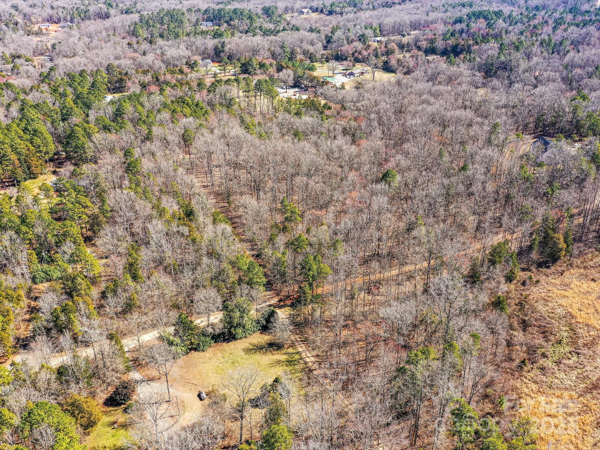 0 McElroy Road, Unit 168 Waxhaw, NC 28173 - Photo 23 of 32 a view of a yard