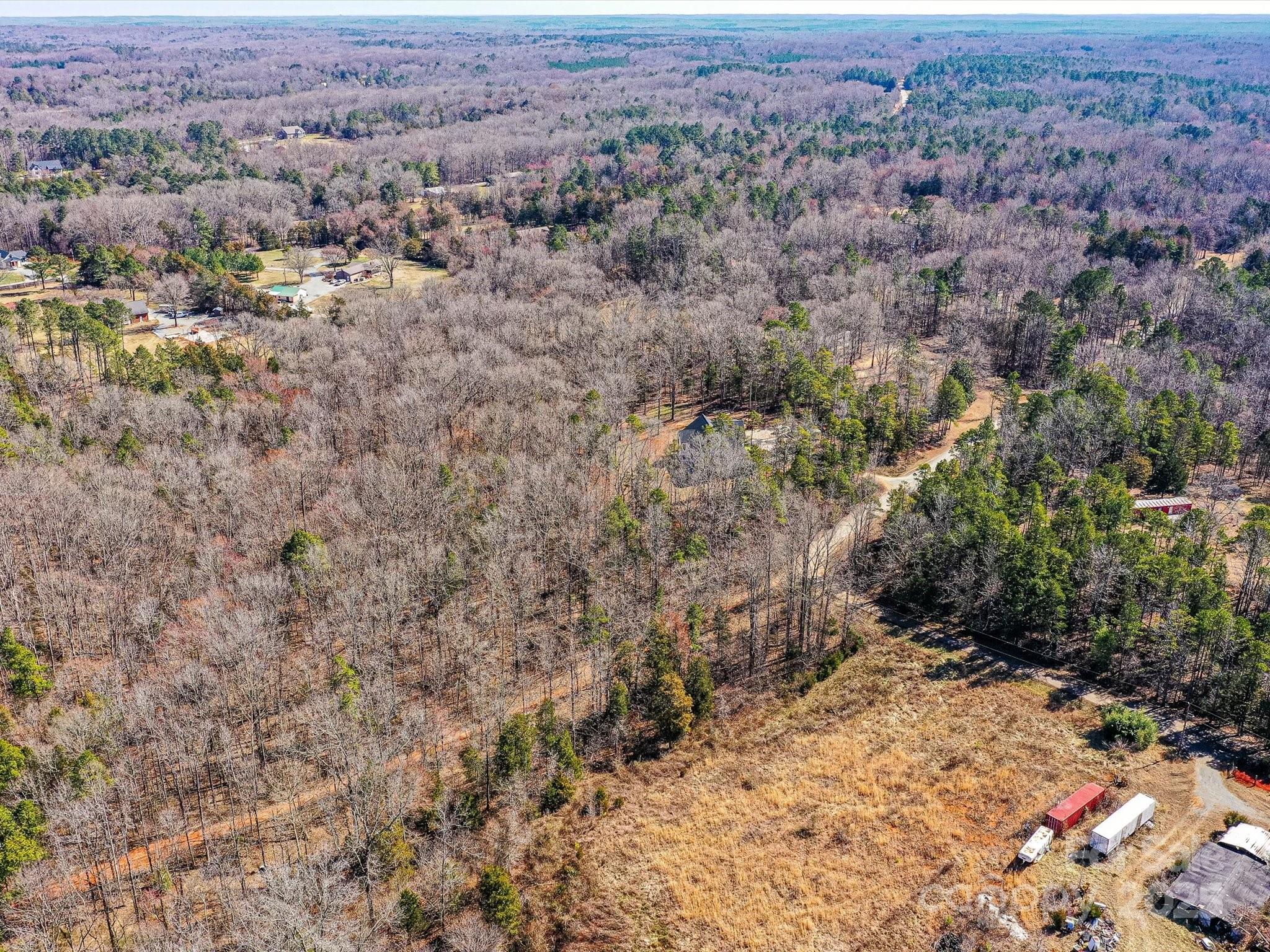 0 McElroy Road, Unit 168 Waxhaw, NC 28173 - Photo 27 of 32 an aerial view of house with yard and mountain view in back