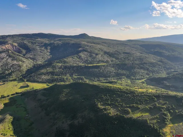 a view of an outdoor space and a lake view