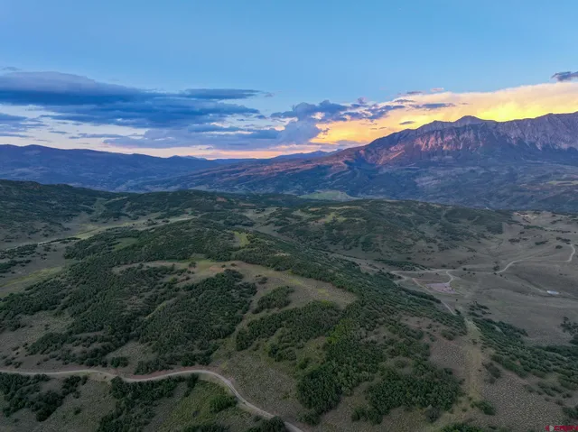 a view of an outdoor space with mountain view